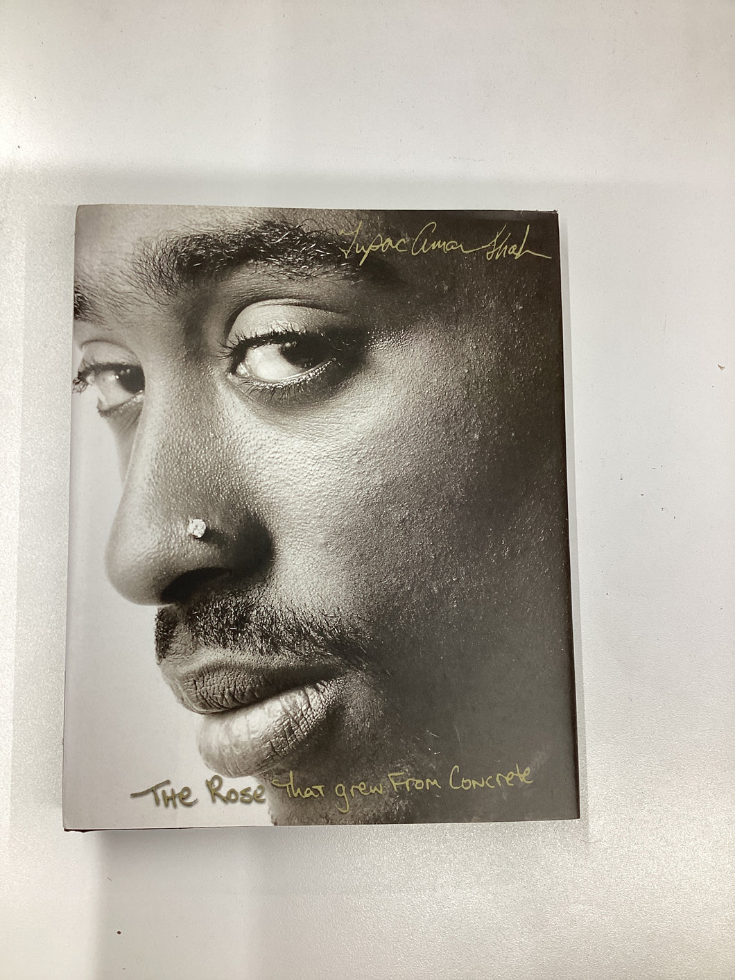 The Rose that grew from Concrete, Tupac Shakur
